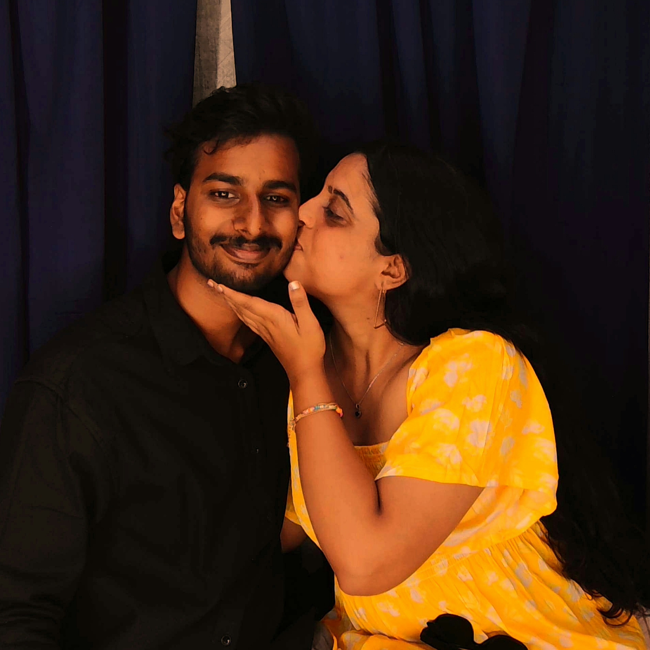 Bhavna kissing Lenal on the cheek